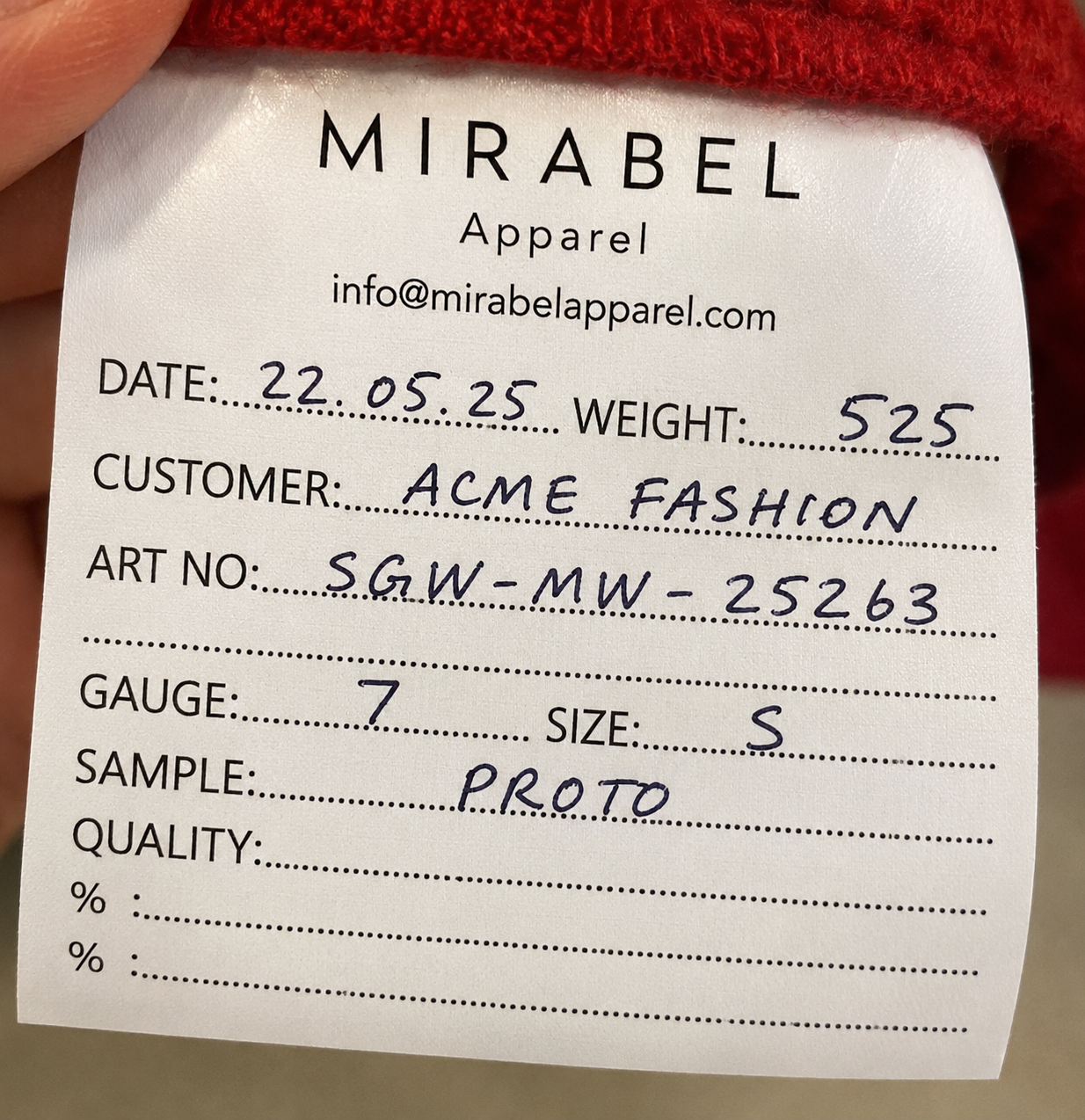 Garment care label photo uploaded to Spindle for AI extraction